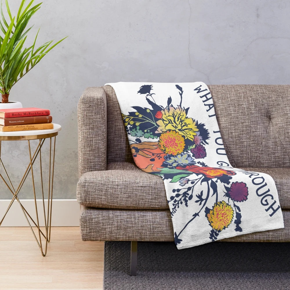 Plush blanket with floral design and inspirational quote