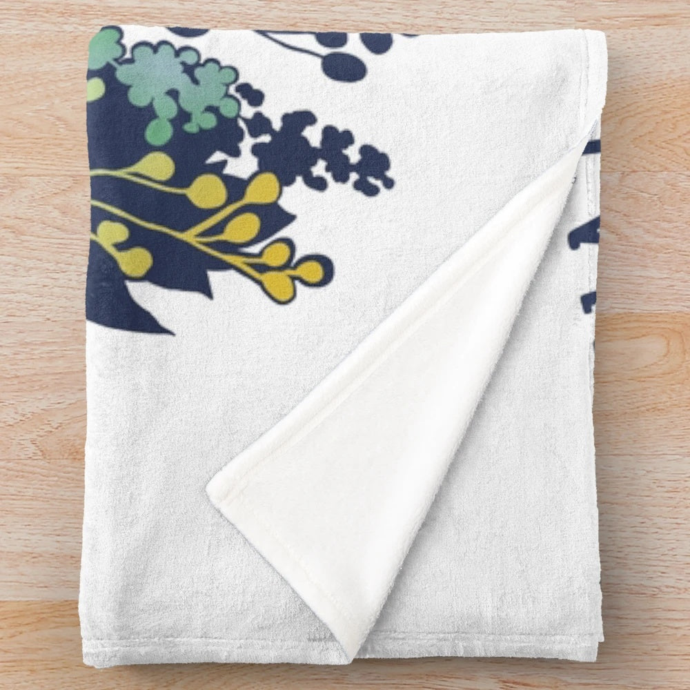 Plush blanket with floral design and inspirational quote
