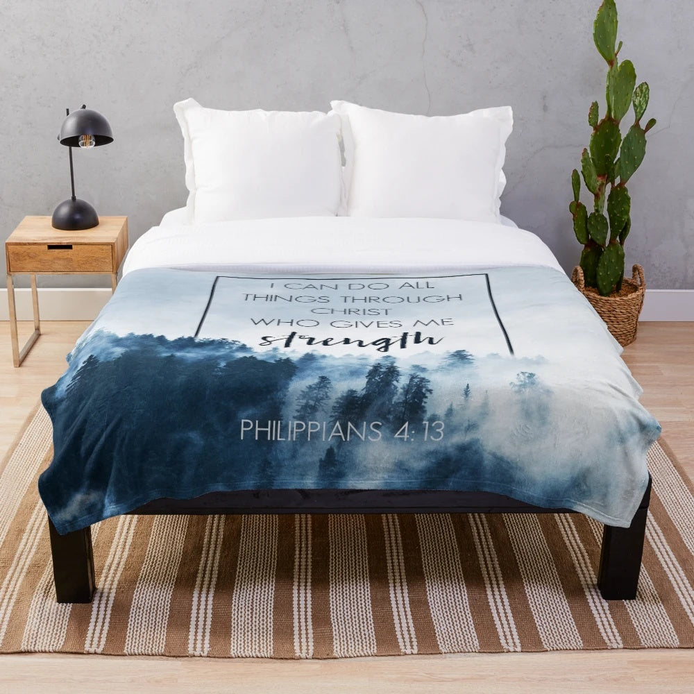 Plush blanket featuring a forest landscape and the Bible verse Philippians 4:13