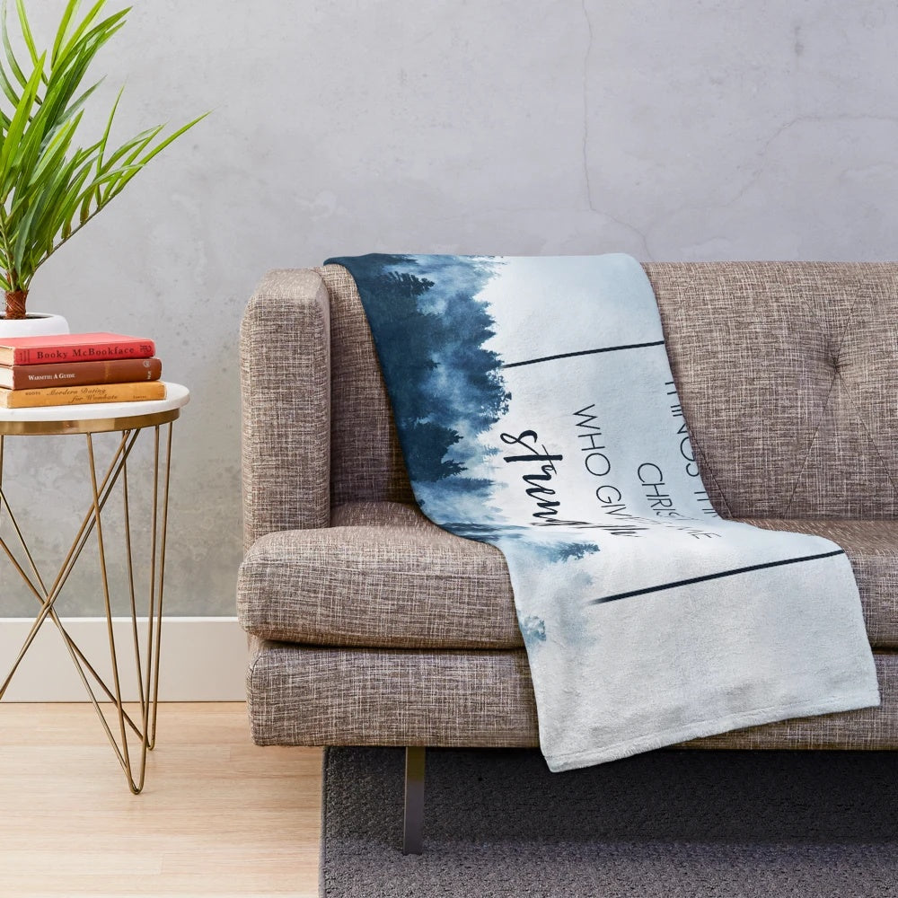Plush blanket featuring a forest landscape and the Bible verse Philippians 4:13