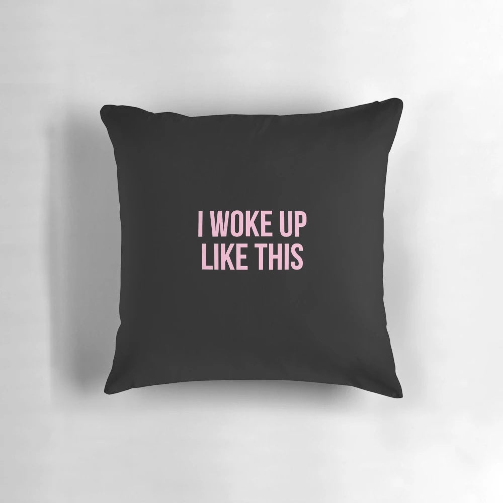 An inspirational pillow featuring the Beyonce quote "I Woke Up Like This