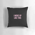 An inspirational pillow featuring the Beyonce quote "I Woke Up Like This