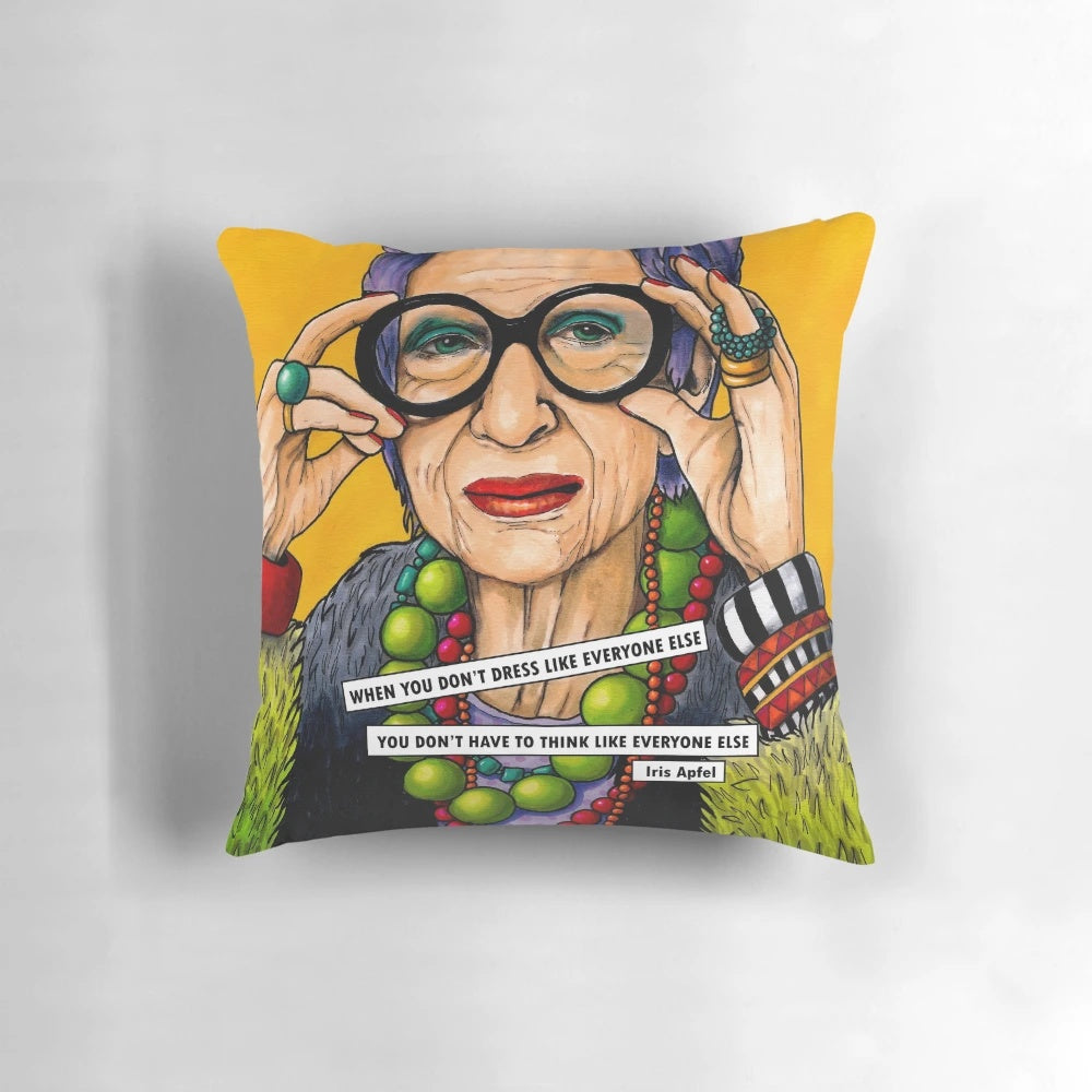 Decorative throw pillow featuring a portrait of style icon Iris Apfel
