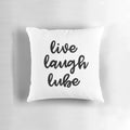 A plush, inspirational pillow with the text 'Live, Laugh, Lube' printed on it.