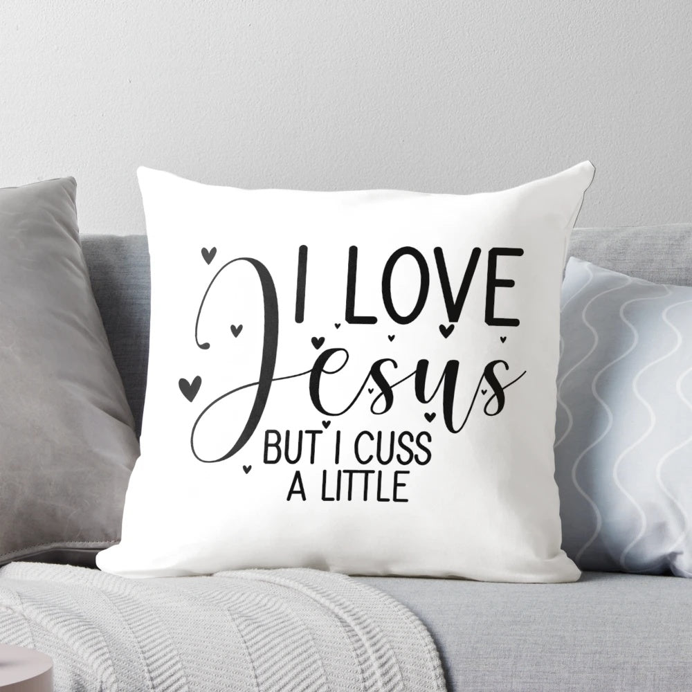 Decorative throw pillow with the text "Love Jesus, but I cuss a little" in a stylish font