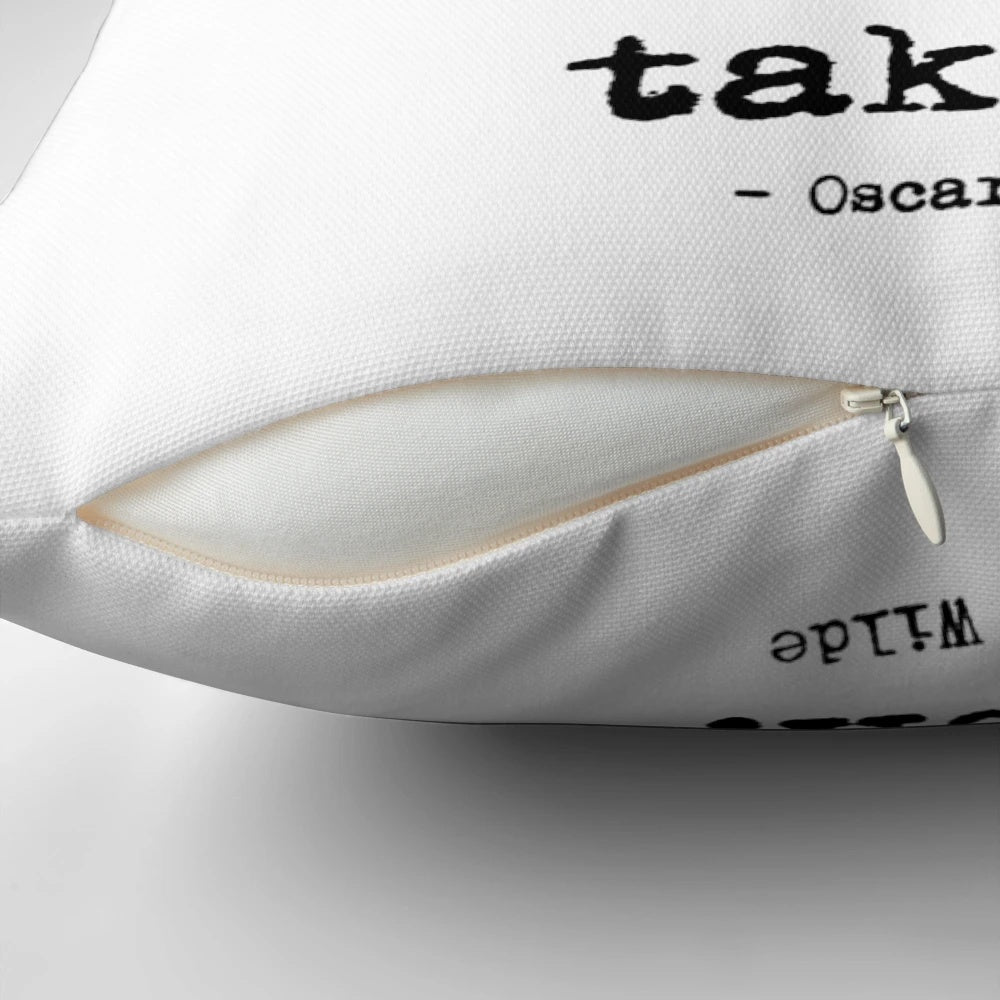 Decorative throw pillow featuring an inspiring quote by renowned Irish writer Oscar Wilde.