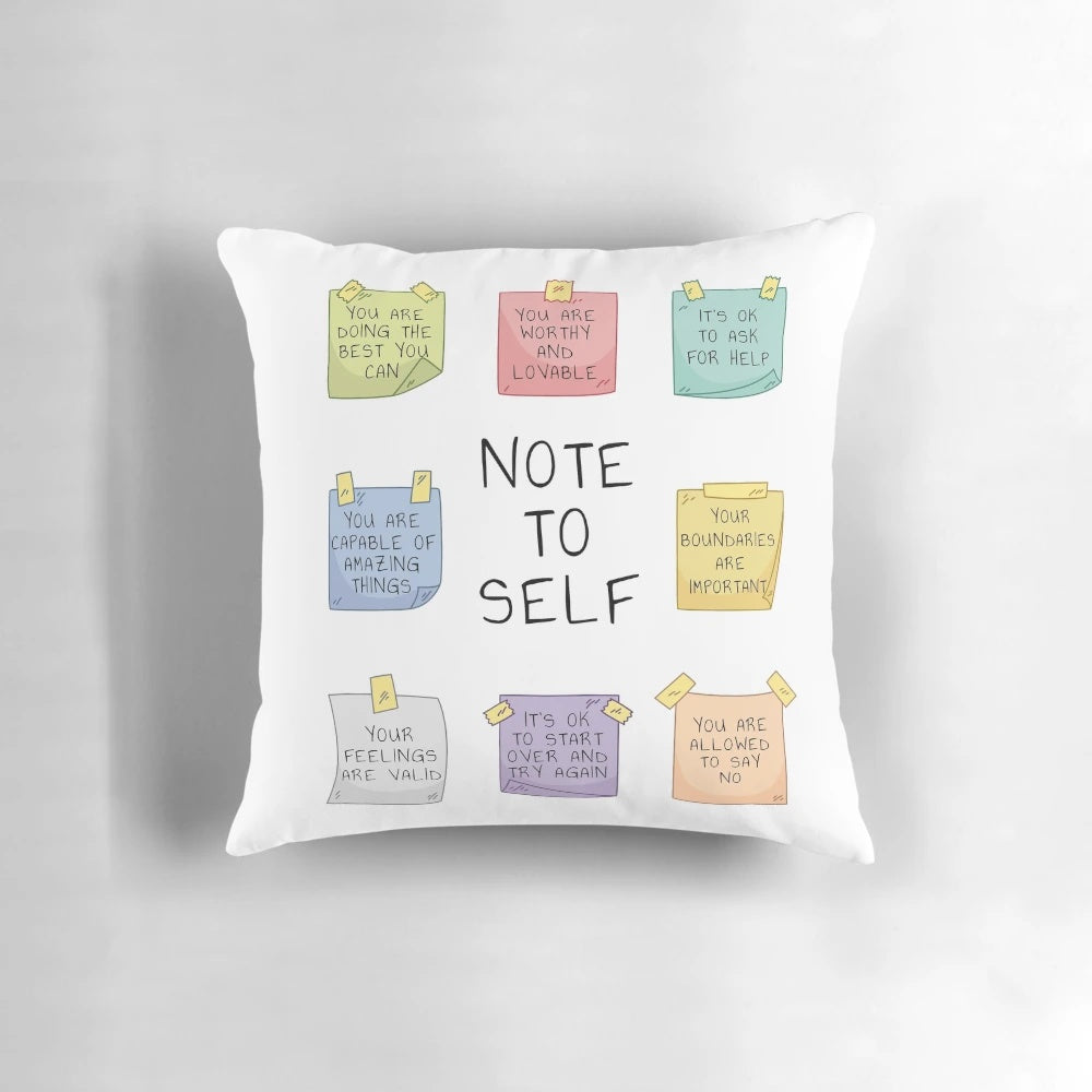Pillow with the words "Note to Self" and mental health-related phrases like "self-love," "self-care," and "be kind to yourself