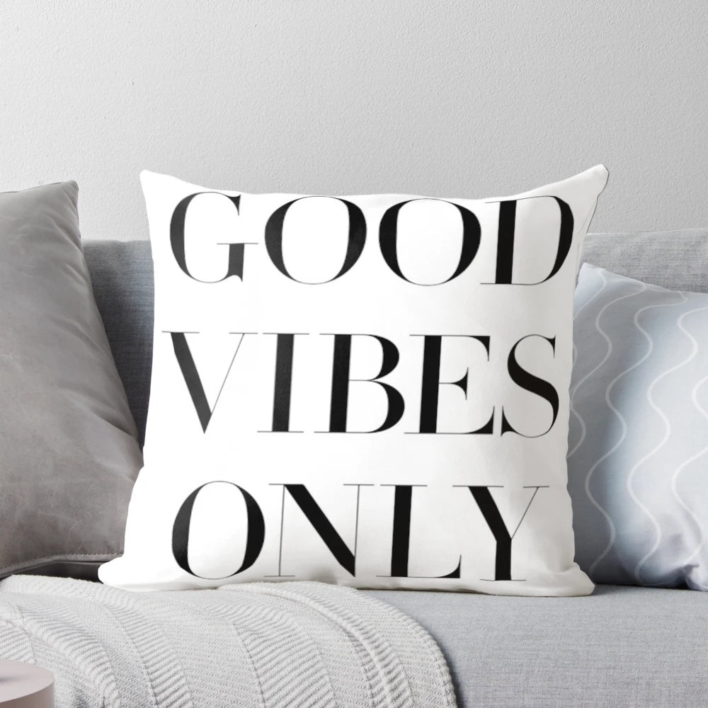 Inspirational pillow with "Good Vibes Only" text in a stylish design