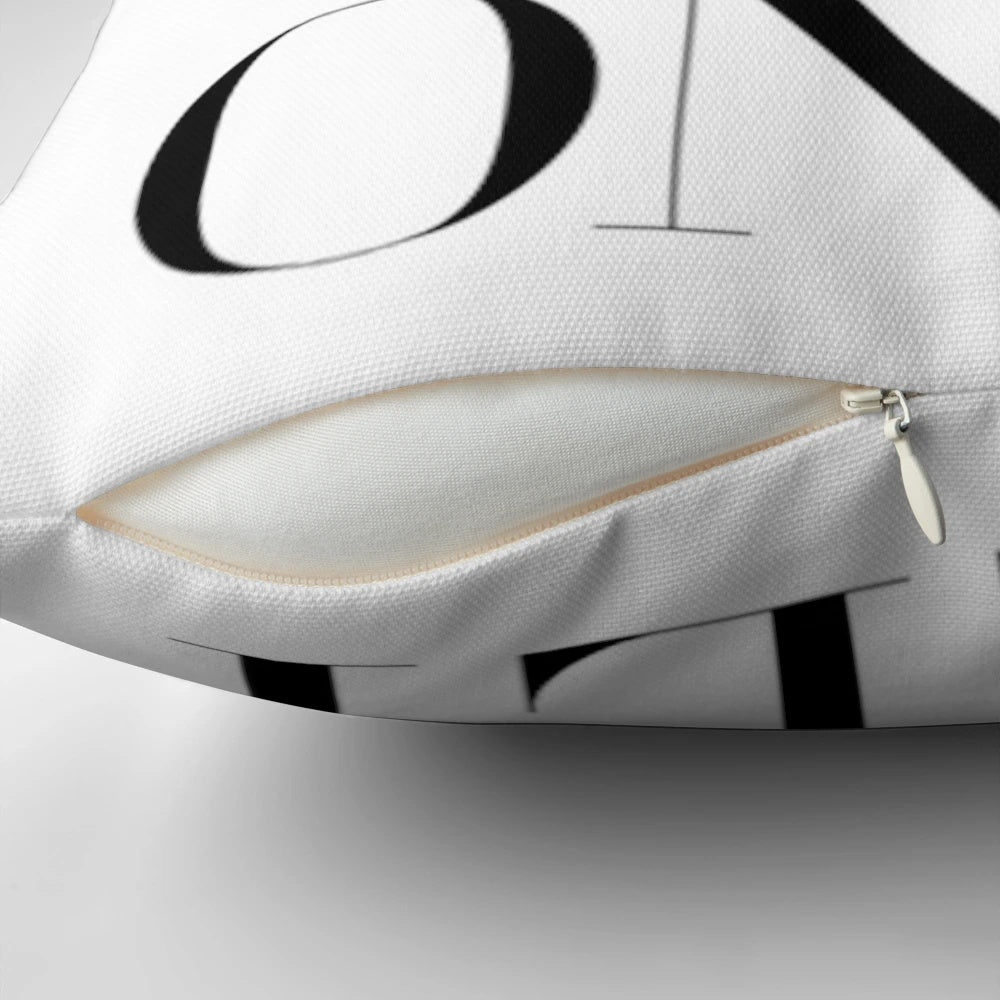 Inspirational pillow with "Good Vibes Only" text in a stylish design