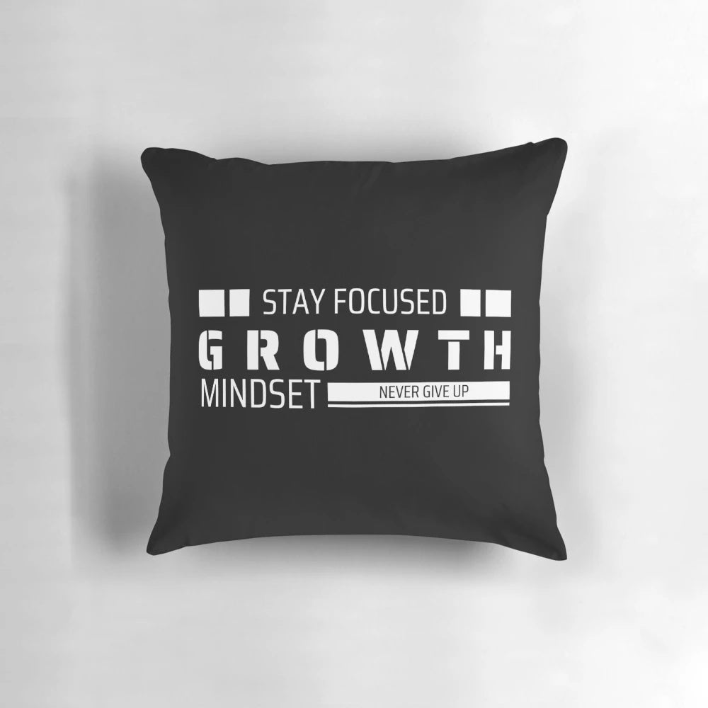 Pillow with motivational "Stay Focused, Grow, Never Give Up" design