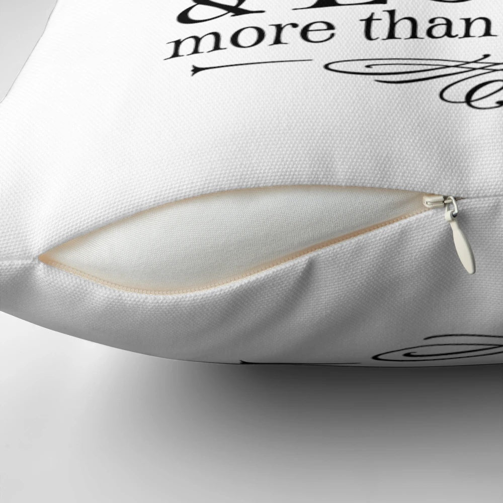 Black and white throw pillow with the text "You are braver than you believe" in a stylized font.