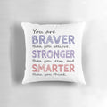 Inspirational pillow with the quote "You are braver than you believe, stronger than you seem, and smarter than you think