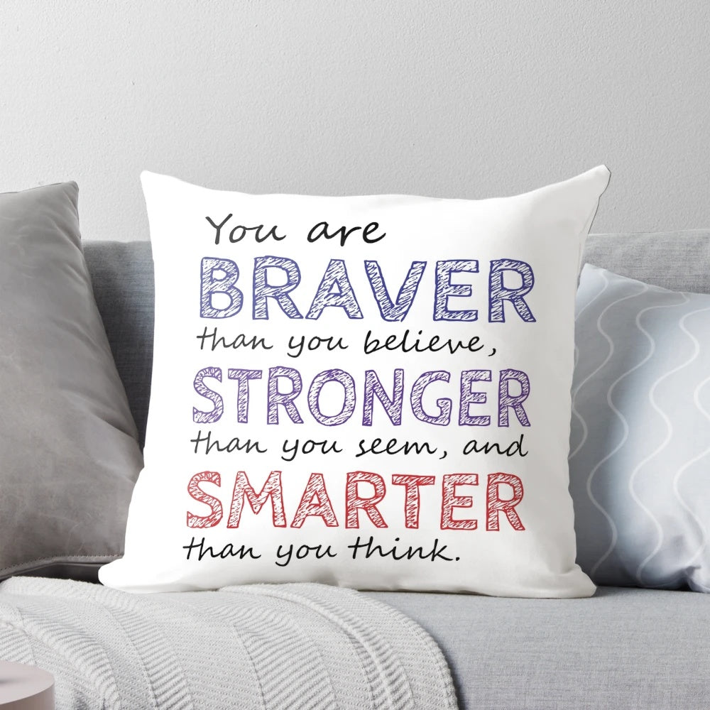Inspirational pillow with the quote "You are braver than you believe, stronger than you seem, and smarter than you think