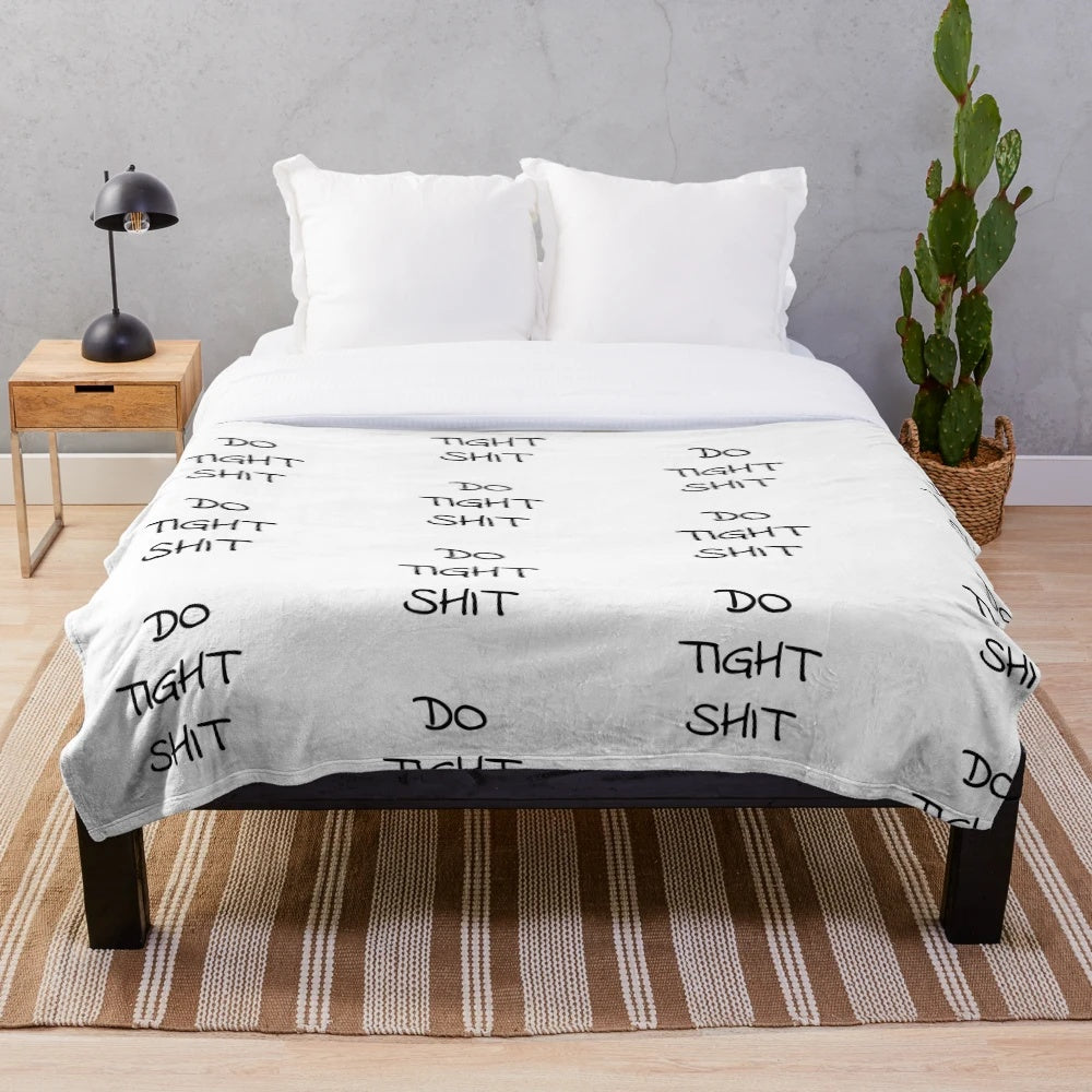 Plush blanket with motivational text "Do Tight Shit