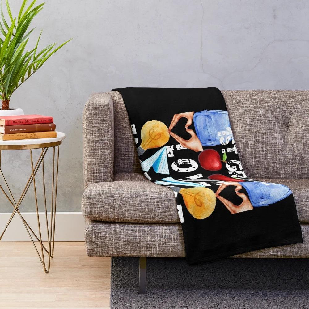 Plush blanket with text that reads "Teach, Love, Inspire" for 1st grade teachers