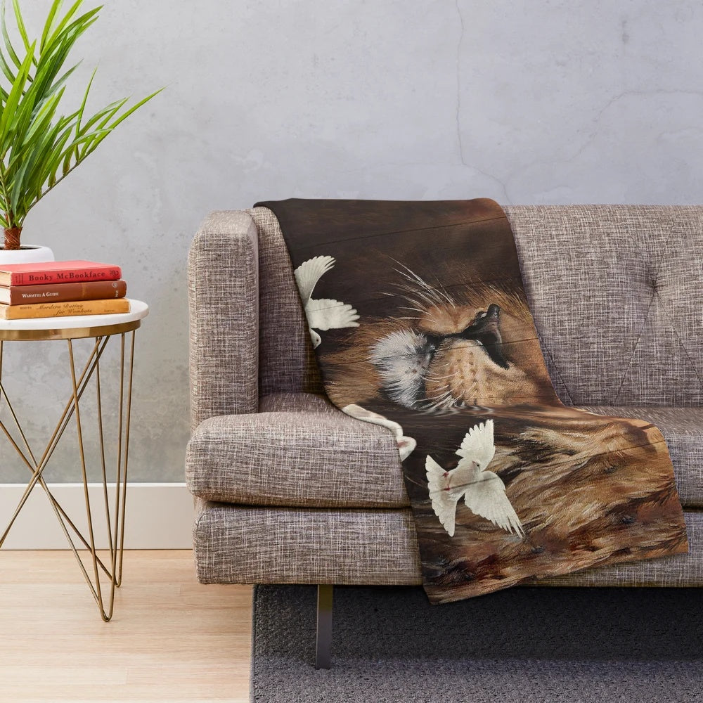 Plush blanket featuring the Lion of Judah and the Lamb of God
