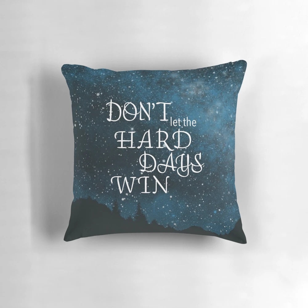 A decorative pillow with a quote from Sarah J. Maas' A Court of Thorns and Roses series