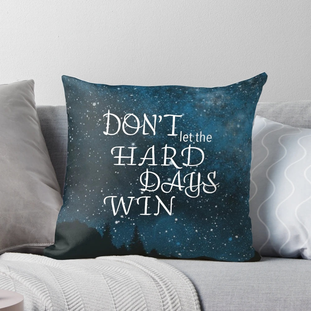 A decorative pillow with a quote from Sarah J. Maas' A Court of Thorns and Roses series