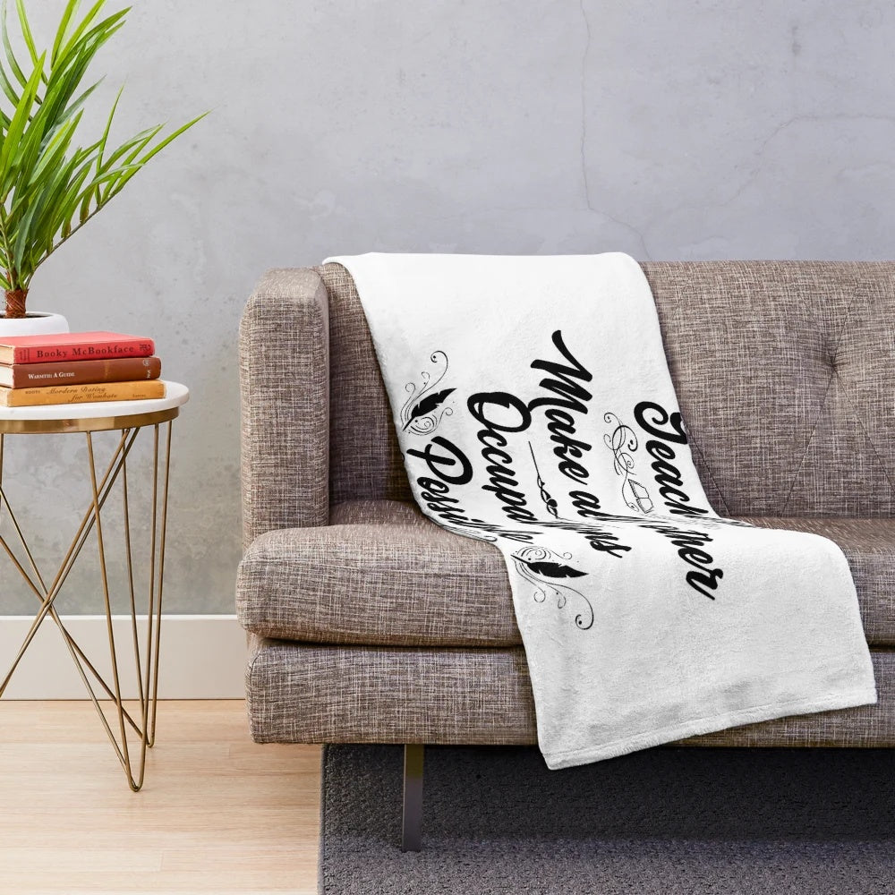 Black and white plush blanket with text "Teachers Make All Other Occupations Possible
