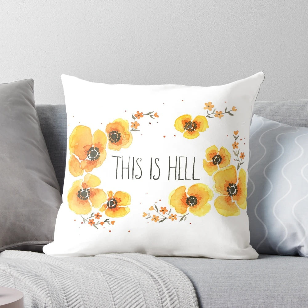 A vibrant, floral-inspired "This is Hell" throw pillow with a motivational quote.