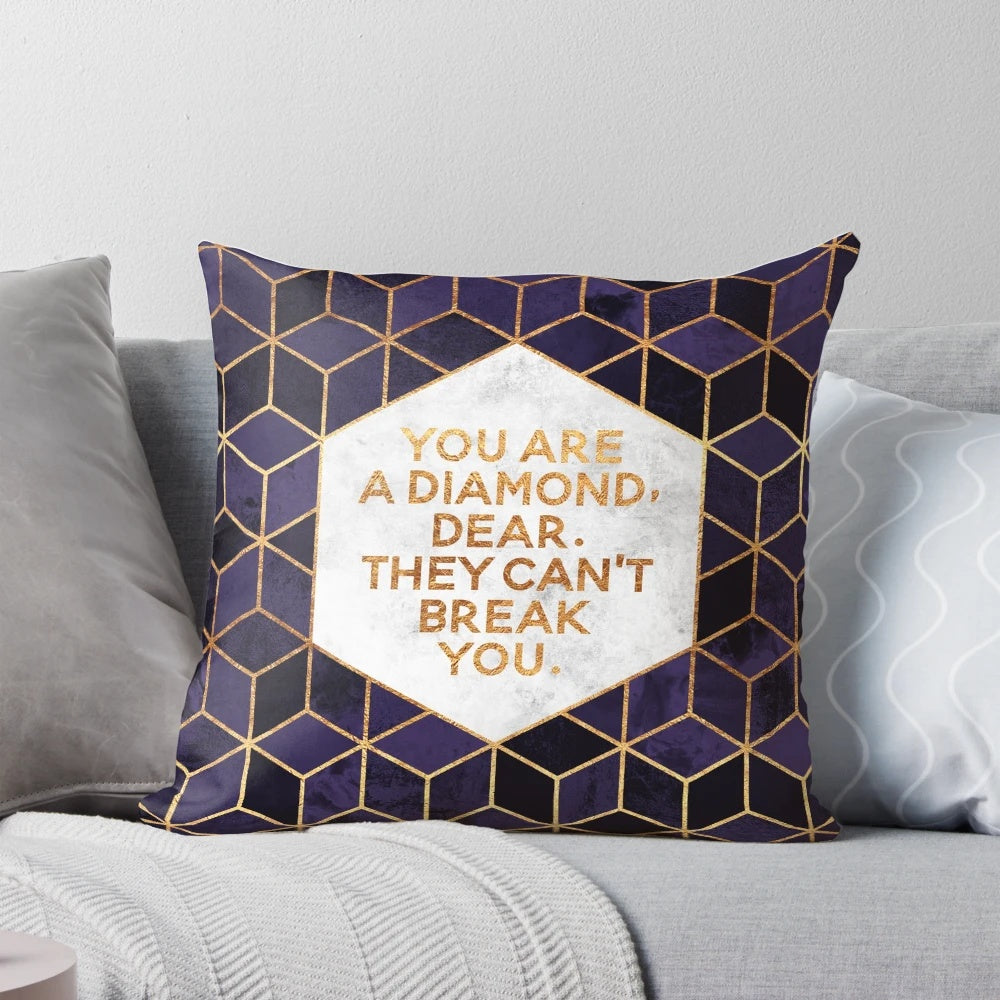 Decorative purple and geometric throw pillow with motivational quote "You are a diamond, dear.