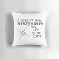 Throw pillow featuring the inspirational travel quote "I Haven't Been Everywhere But It's On My List" by Susan Sontag, with a globe and compass design.