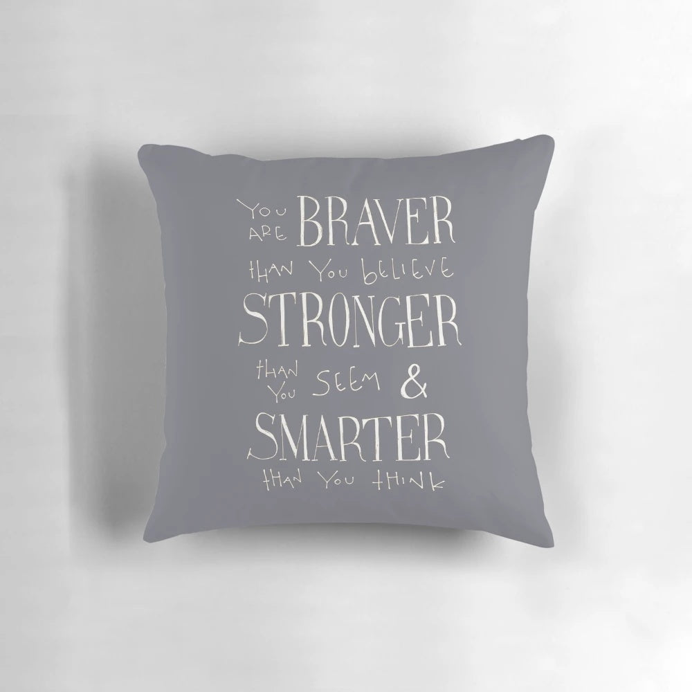 Monochrome hand-lettered pillow with motivational quote in a modern, minimalist style