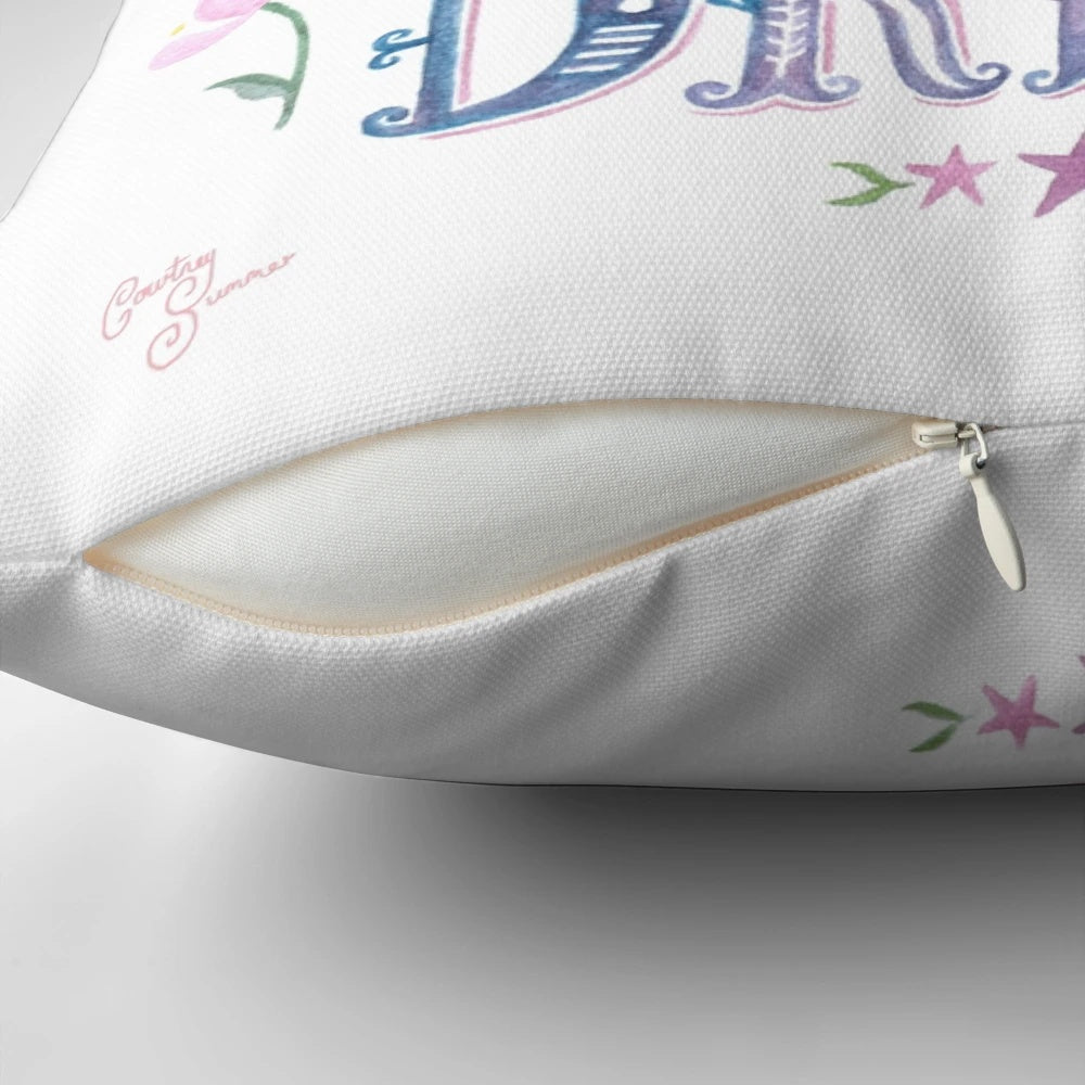 Colorful watercolor-style illustration of mountains and flowers with the words "Climb Every Mountain" on a soft, plush throw pillow.