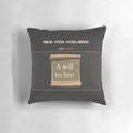 Close-up of a white pillow with the text "Will to Live" printed on it, a design that combines gaming, memes, and inspirational messages.
