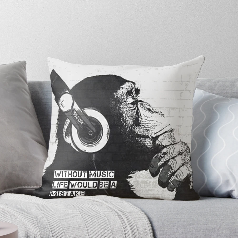 Decorative throw pillow featuring a Banksy-inspired "Without Music Life Would Be A Mistake" street art design