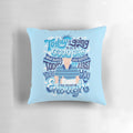 An inspirational throw pillow with the text "You're you and that's enough" in a hand-lettered style.