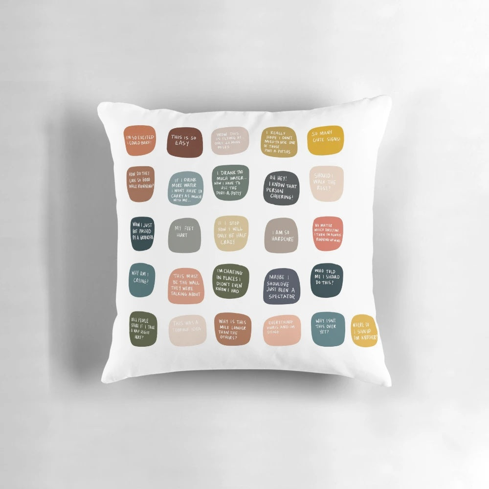 A pillow with the text "Thoughts while running a marathon..." on it.