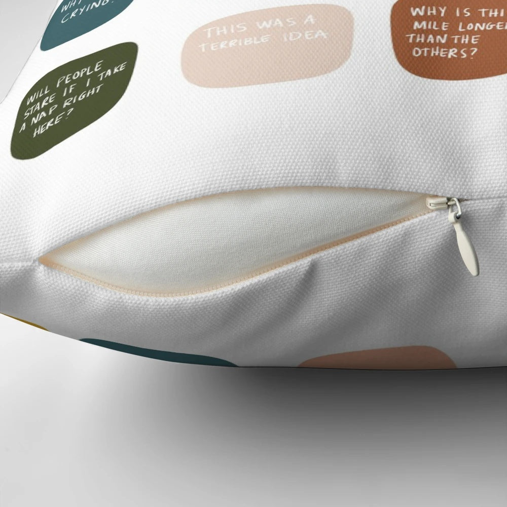 A pillow with the text "Thoughts while running a marathon..." on it.