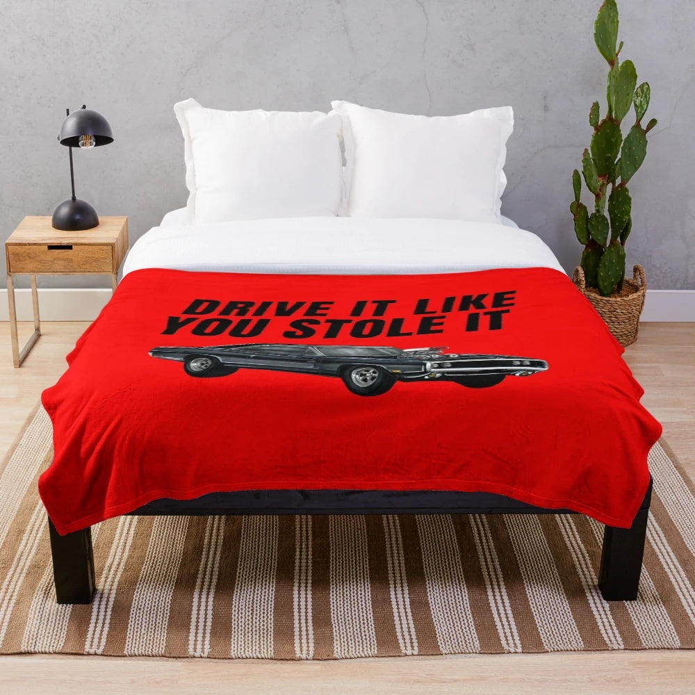 A plush blanket featuring the iconic Dodge Charger from the Fast and Furious movie franchise
