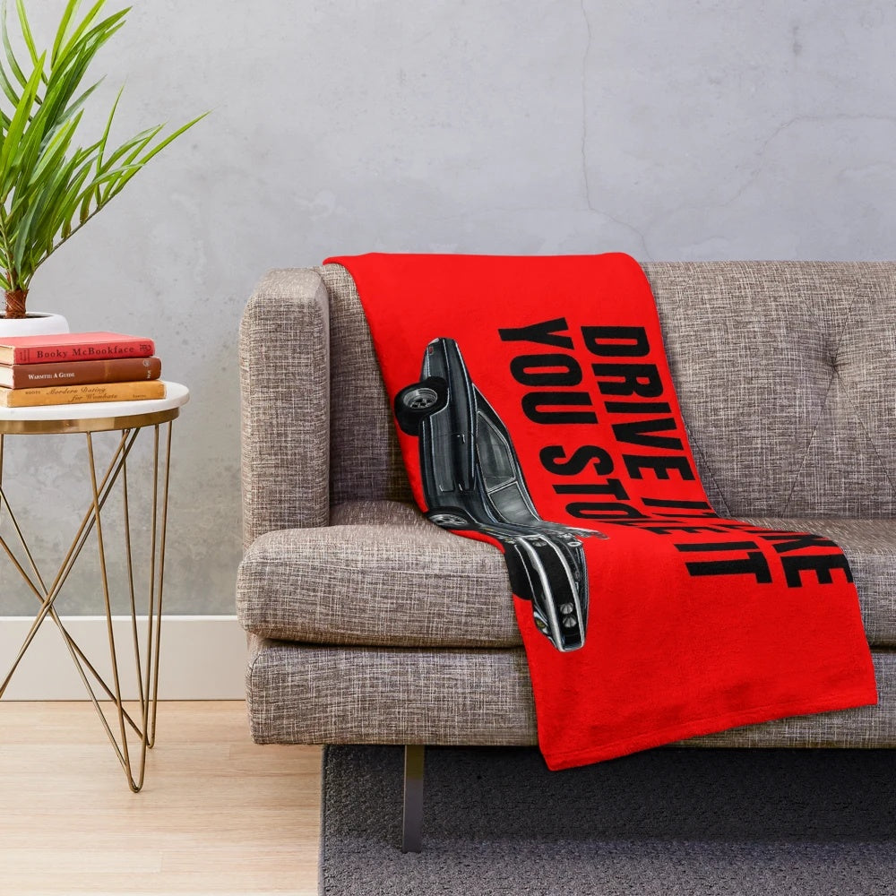 A plush blanket featuring the iconic Dodge Charger from the Fast and Furious movie franchise