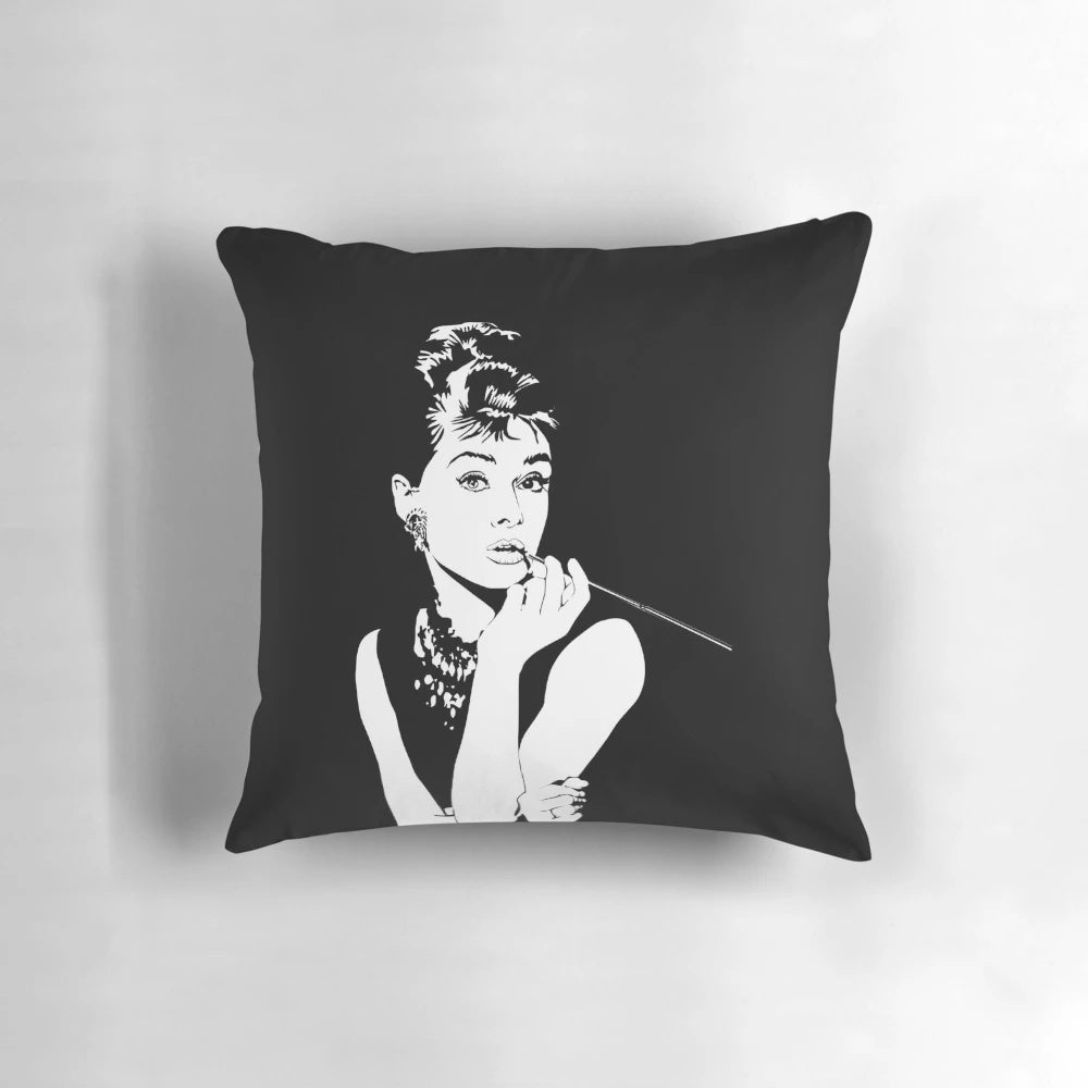 Breakfast at Tiffany's-inspired decorative pillow featuring Audrey Hepburn's iconic character Holly Golightly