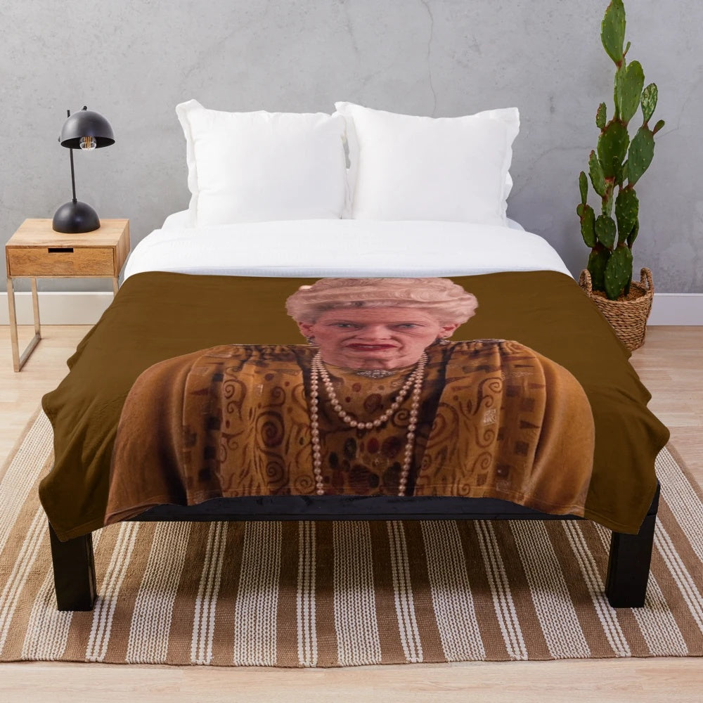 Soft and cozy plush blanket inspired by the films of Wes Anderson featuring Tilda Swinton
