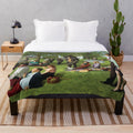 Seurat-inspired plush blanket featuring characters from the TV show The Office