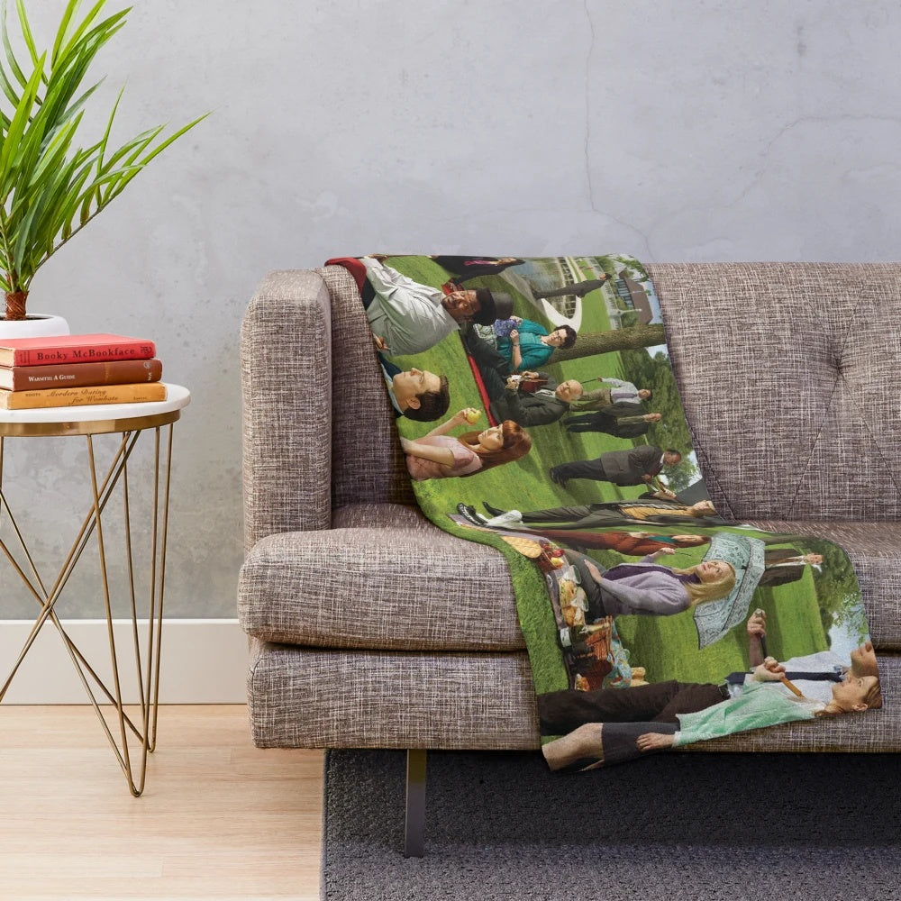 Seurat-inspired plush blanket featuring characters from the TV show The Office