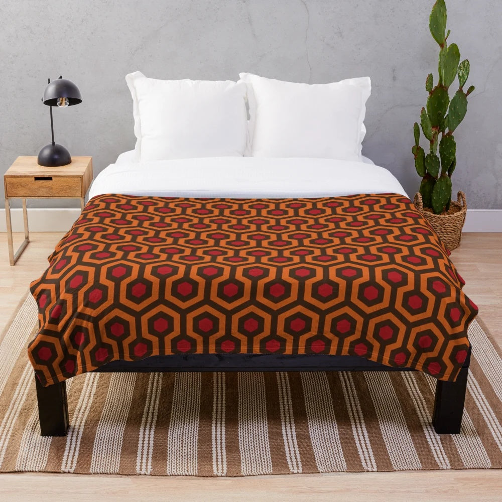 Plush blanket with Overlook Hotel carpet design from The Shining movie