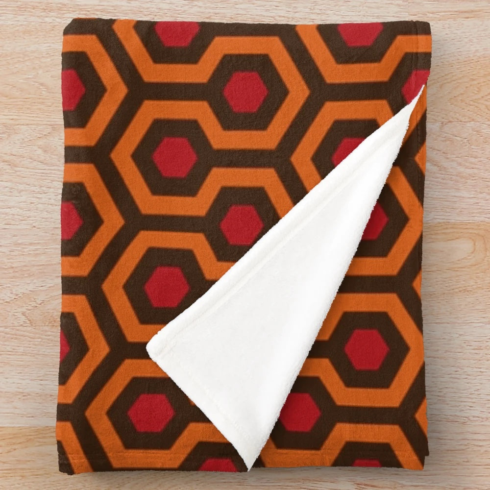 Plush blanket with Overlook Hotel carpet design from The Shining movie