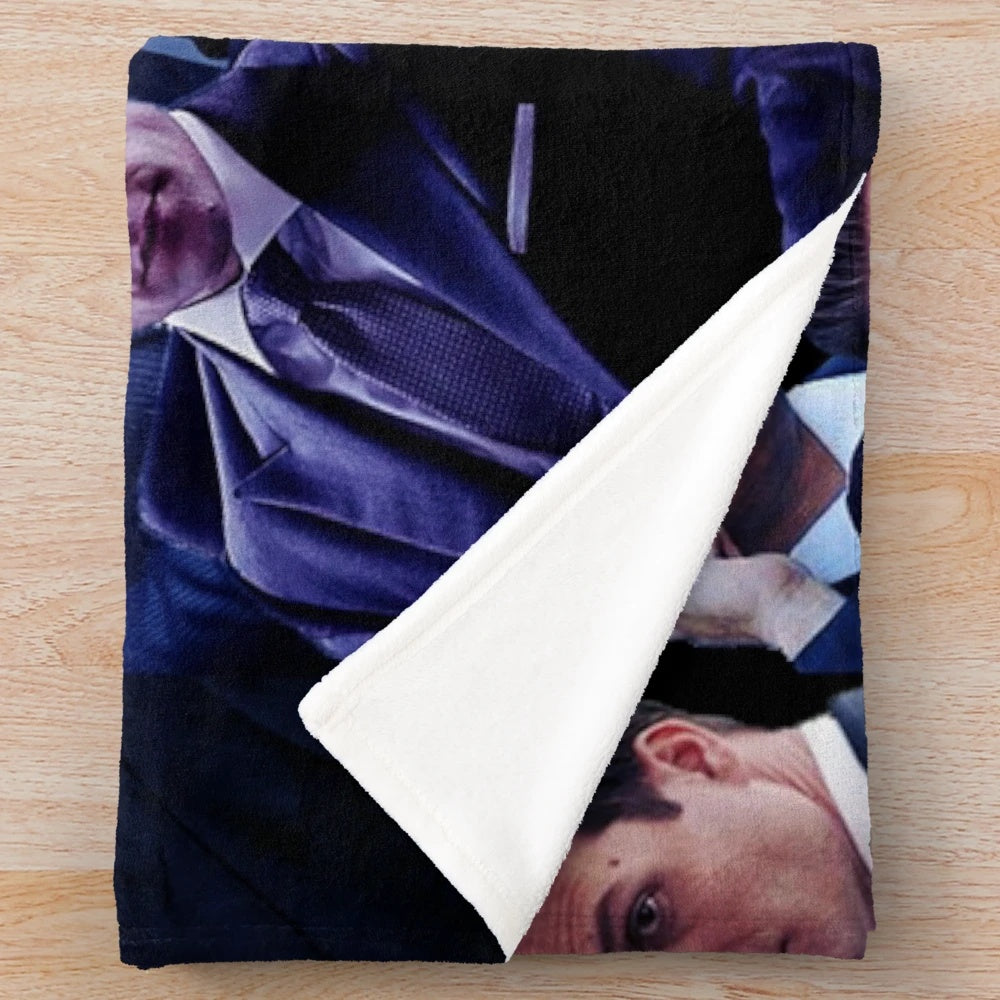 Plush blanket with a collage design featuring characters from the TV series Suits