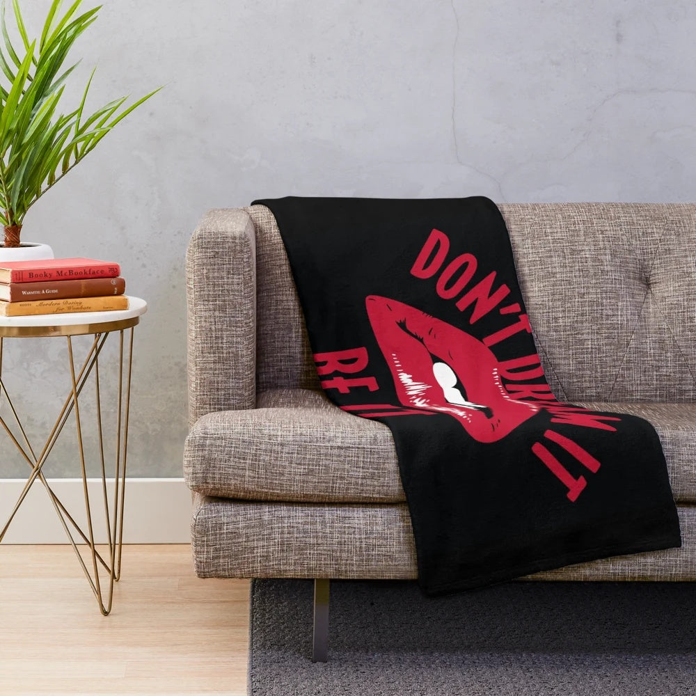 Rocky Horror Picture Show inspired plush blanket with "Don't Dream It, Be It" design
