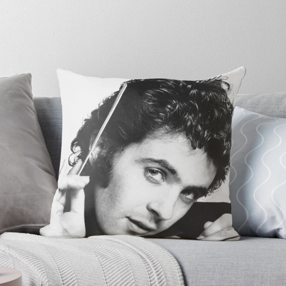 A cozy throw pillow featuring a stylized design of David Essex, the iconic British singer and actor.