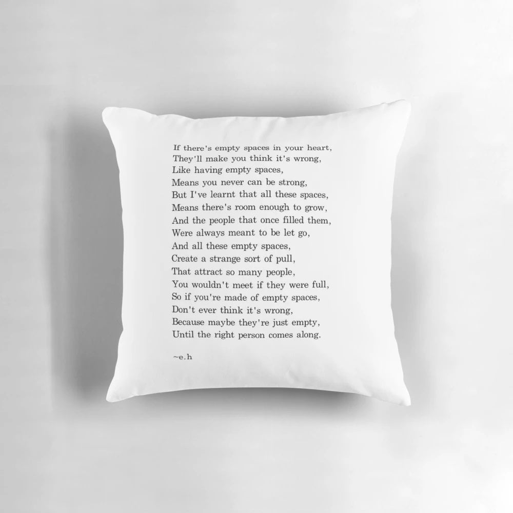 A beautiful pillow featuring an inspirational quote by Ernest Hemingway, perfect for self-care and romantic home decor.