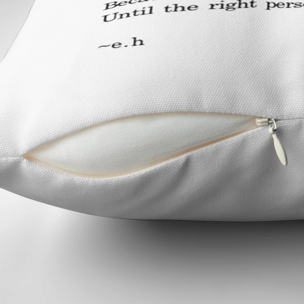 A beautiful pillow featuring an inspirational quote by Ernest Hemingway, perfect for self-care and romantic home decor.