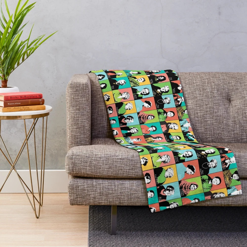 Plush blanket featuring illustrations of feminist icons like RBG, Jane Goodall, and Katherine Johnson