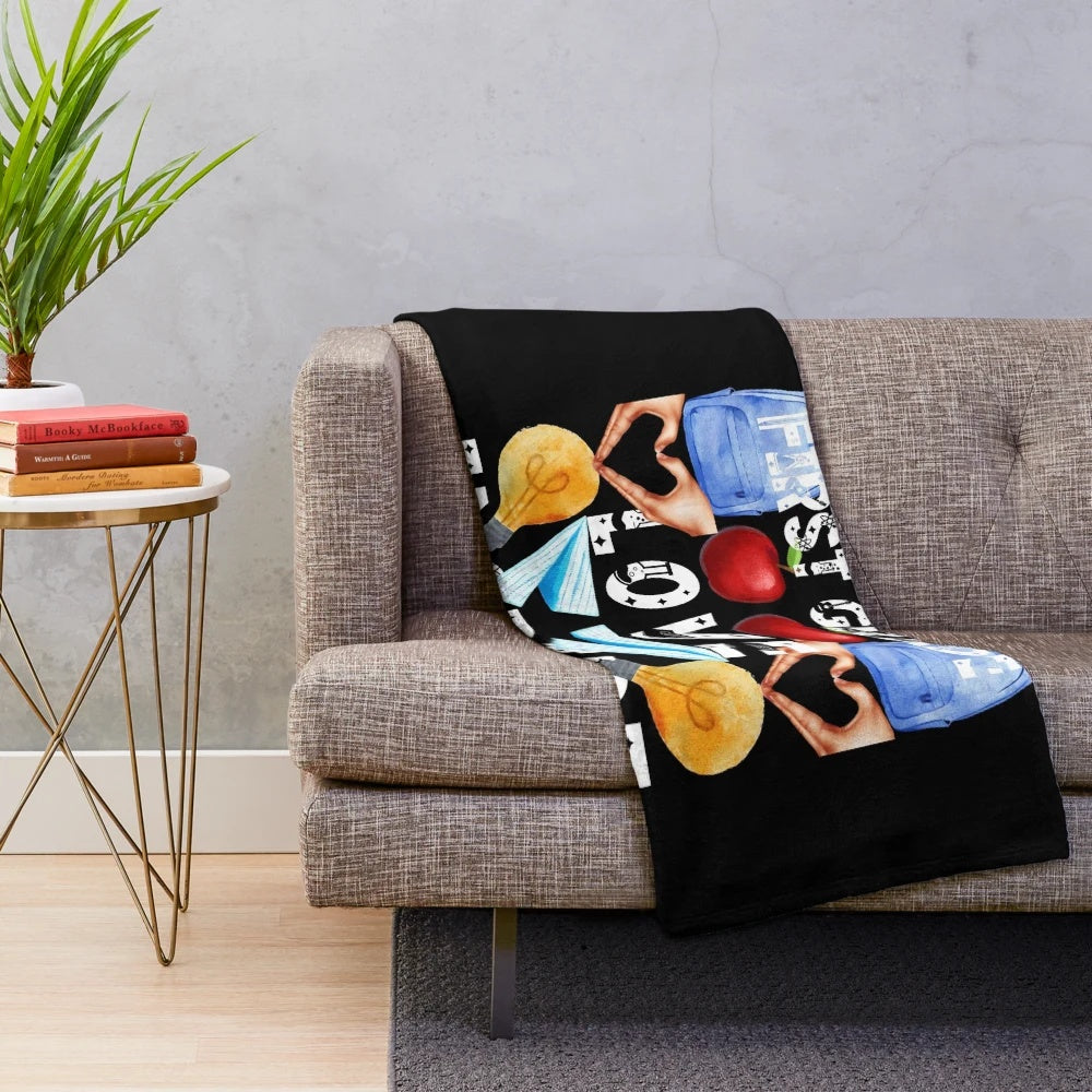 Plush blanket with text "teach first grade love inspire; the future of the world is in my classroom