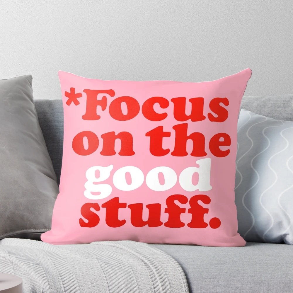 Vintage-inspired "Focus on the Good Stuff" pillow in pink and red colors