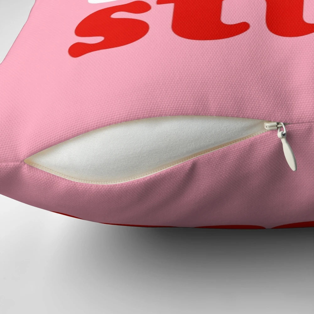 Vintage-inspired "Focus on the Good Stuff" pillow in pink and red colors